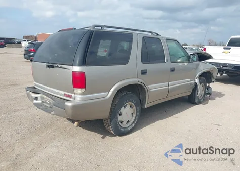 2000 GMC Jimmy Sle z USA, uszkodzony, nr VIN 1GKCS13WXY2155821